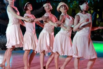 dancers in pink flapper dresses