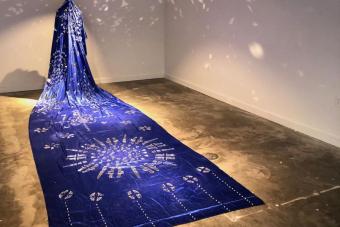 image of blue cloth draped across floor