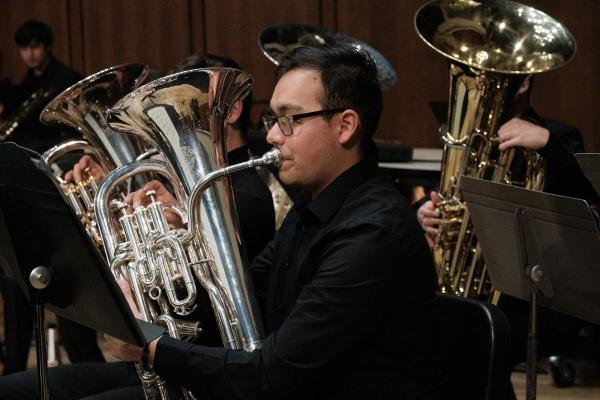 A euphonium player during a Wind Symphony concert on the Bates Stage