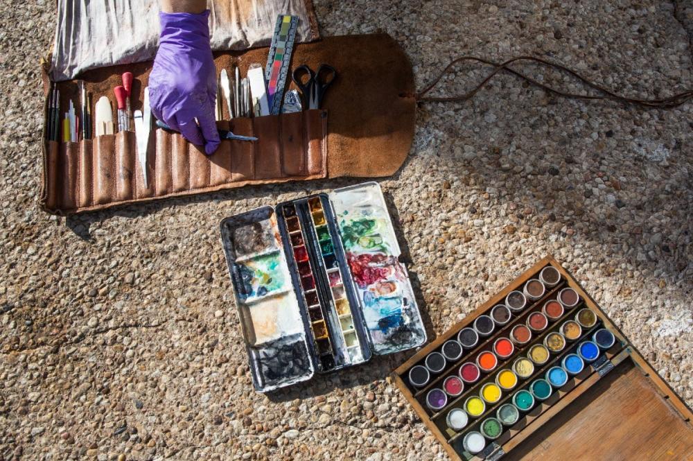 Pigments and conservation tools laid out for detailed work on one of Landmarks’ outdoor sculptures.