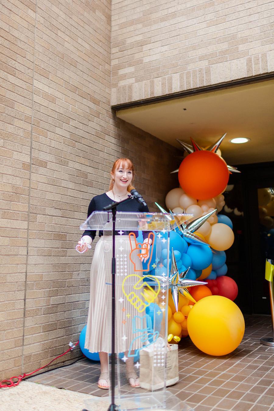 Recent Design graduate Jessica Sutherland speaks at the opening of the new Kendra Scott Center. Sutherland served on the KS WEL Institute's Student Advisory Board, worked as an intern and continues her design work for the program. Photo by Sarah Wong