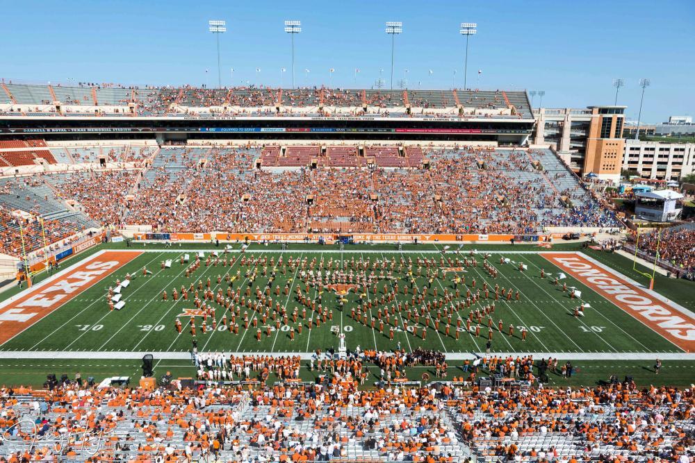 he UT Longhorn band performing a halftime show in the Darrell K Royal-Texas stadium