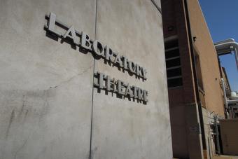 A limestone building face with "Laboratory Theatre" on the front