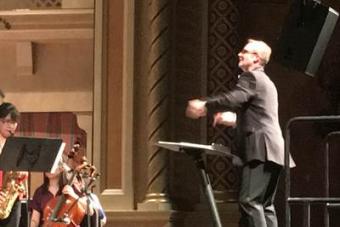 James Welsch conducts a youth orchestra