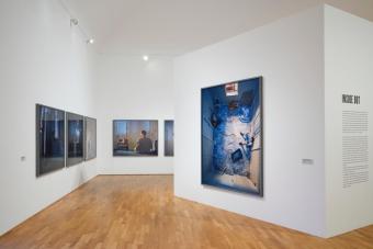 installation view of photos in a gallery
