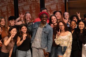 Andre 3000 posing with Butler Music Students