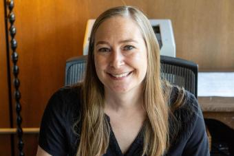 Assistant Director for Admission, Sarah Goerg, sitting behind a desk