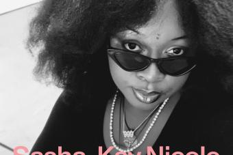 black and white headshot of Sasha-Kay Nicole