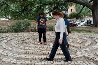 Students walk through a labyrinth as part of their Within Walking Distance class