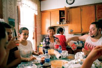 image of a family eating at a table