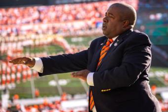 Clifton Croomes conducting a marching band