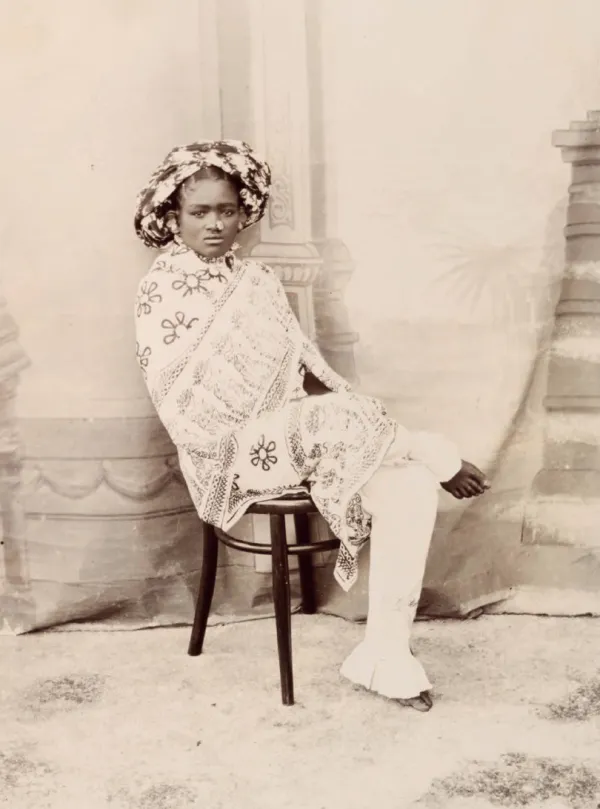 image of a person sitting in a chair in sepia tones