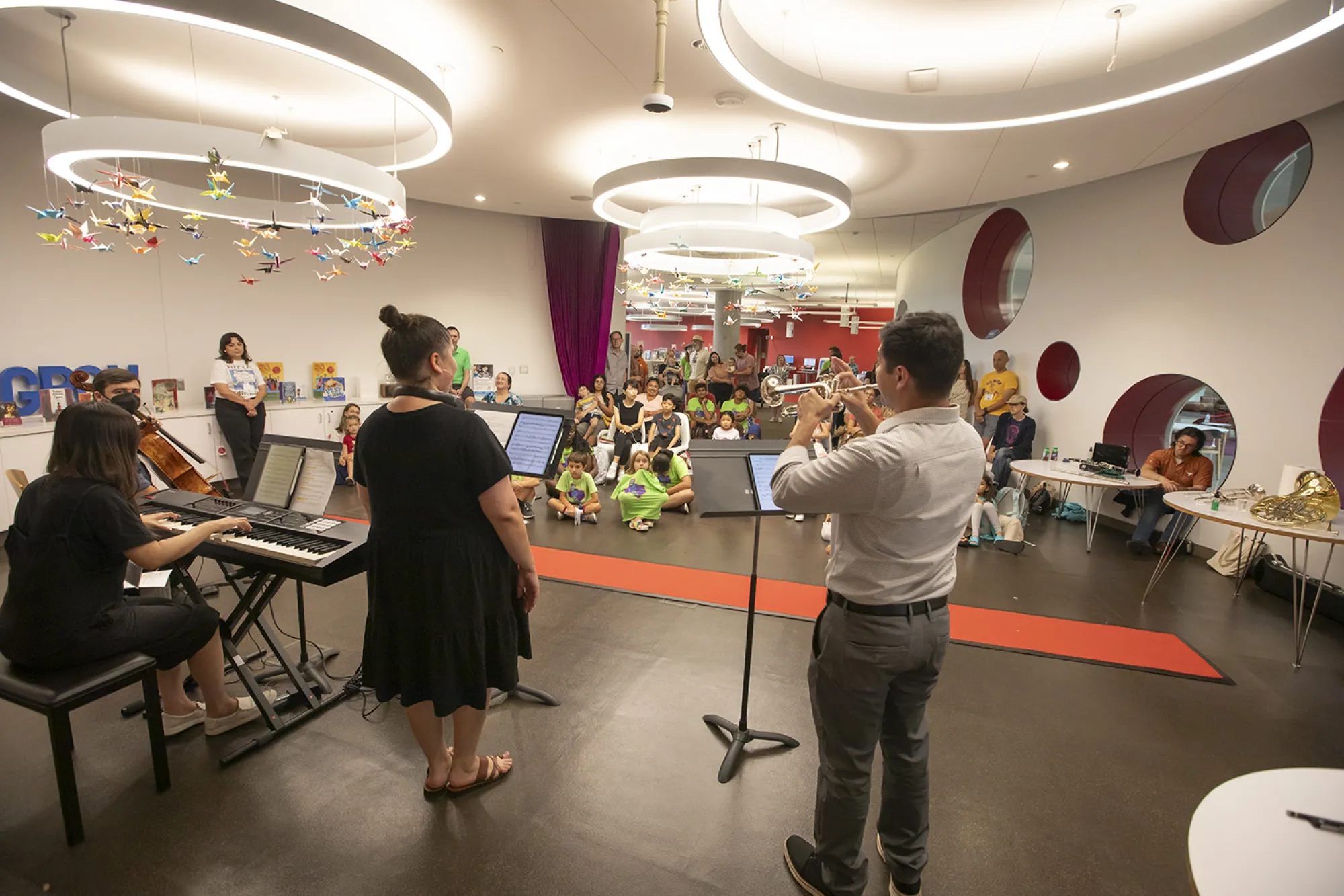 A trumpet player performs as part of the Meet the Opera series