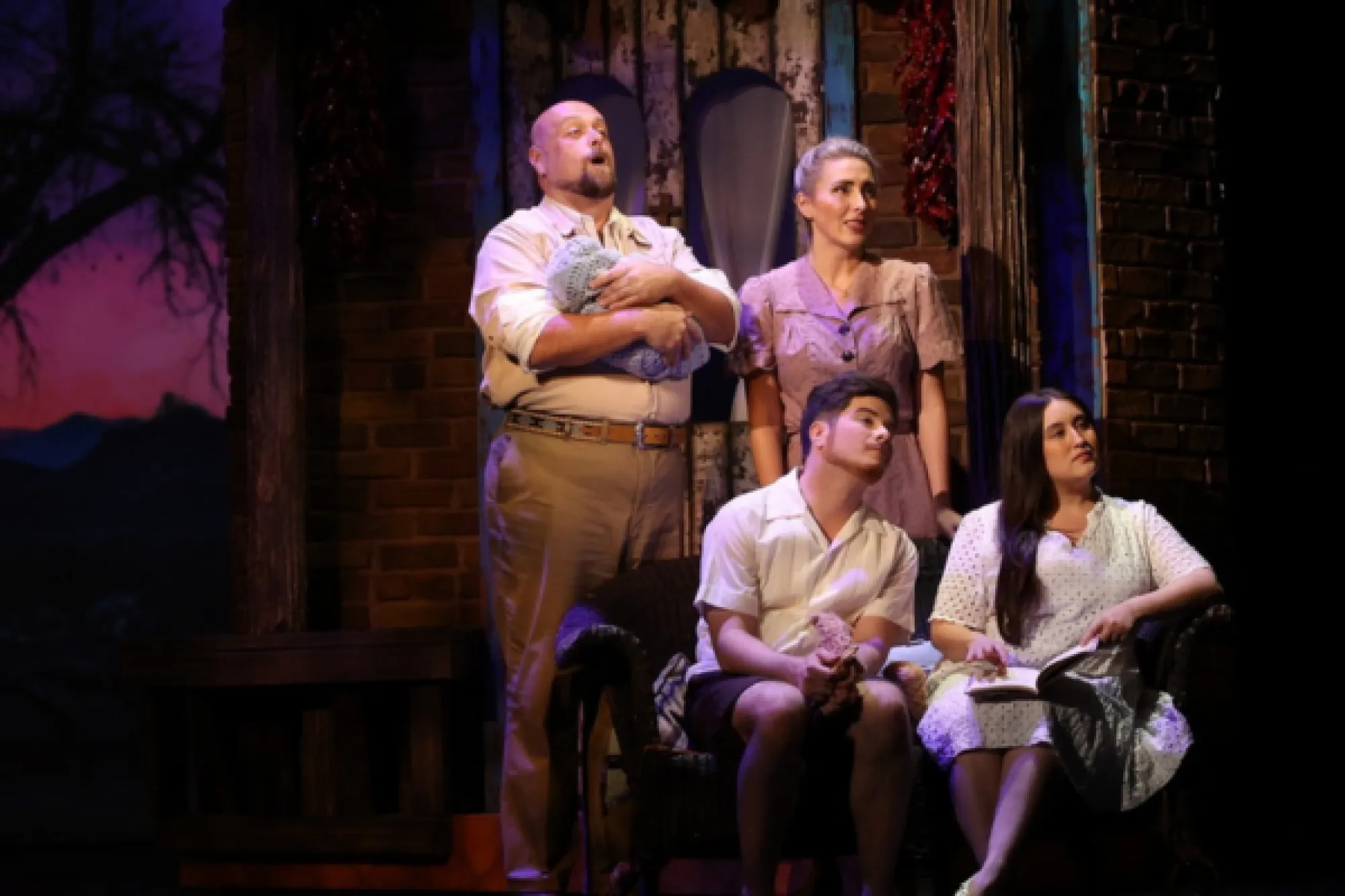 Cast members of Downwind on stage