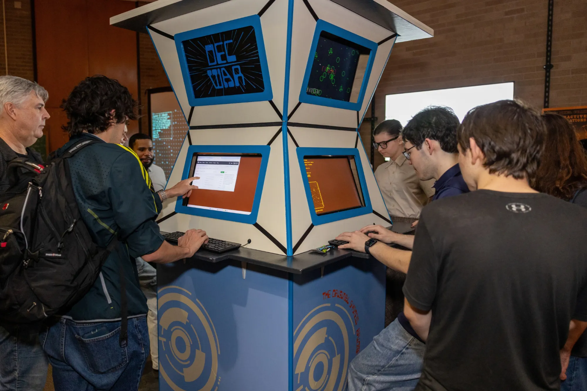 Students at game kiosk