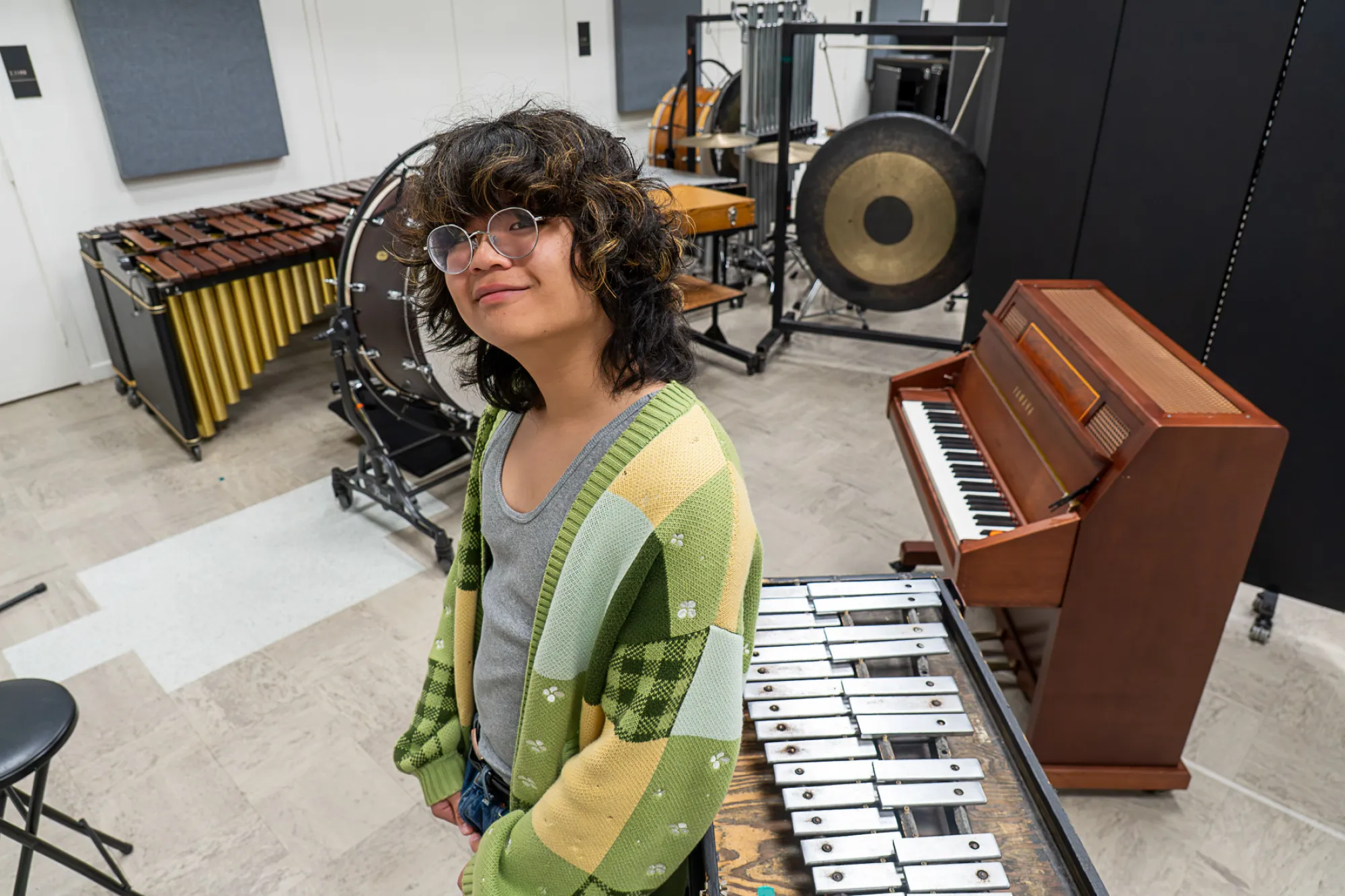 Butler School of Music student Brandon Shen with a xylophone