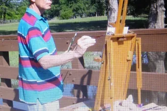 Michael Gillespie paints outdoors