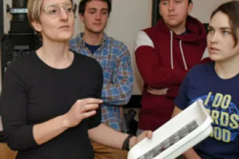 Leah Dyjak teaching students in a photography lab