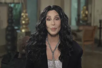 Screenshot of Cher giving a video message to Class of 2021 graduates in the UT College of Fine Arts