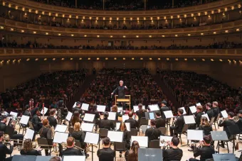 UT wind ensemble on stage 