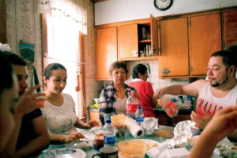 image of a family eating at a table