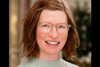 Headshot for Dr. Rachel Merrill Moss, researcher, performer and Assistant Professor in Theatre History