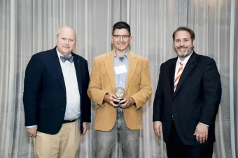 image of three people