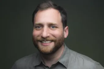 Headshot for actor, director, playwright and teacher Zack Fine