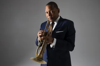 Portrait of Wynton Marsalis with his trumpet