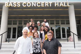 Group photo on steps in front of Bass Concert Hall