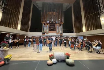 Musicians performing on a concert stage