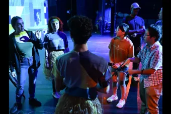 A group of people with sensors attached to their arms