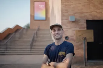 image of a man standing in front of the visual arts center