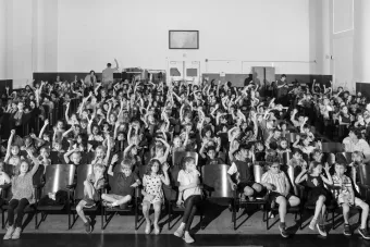 images of students in an auditorium