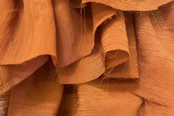 pieces of woven clothe layered over one another