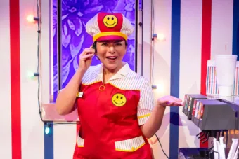 photo of a woman in a red fasts food uniform