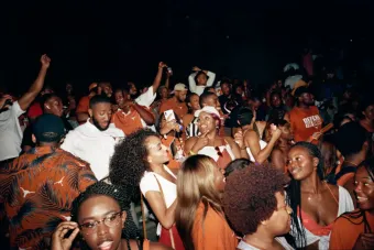 A large group of students dancing and having fun