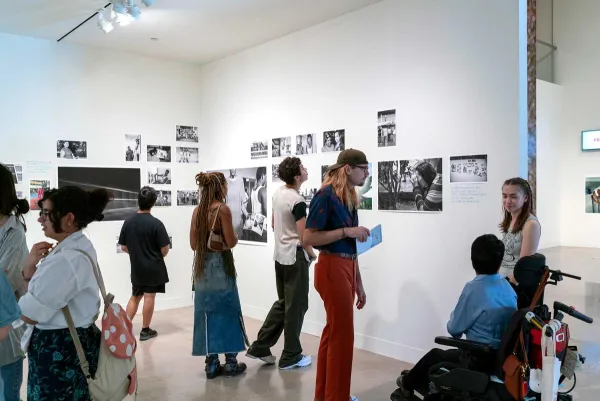 people in gallery during art opening