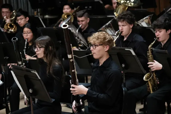 a Bassoonist performs during a Symphony Band concert