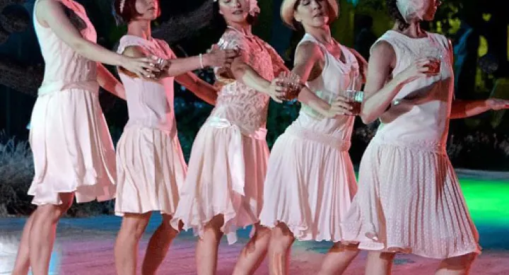 dancers in pink flapper dresses