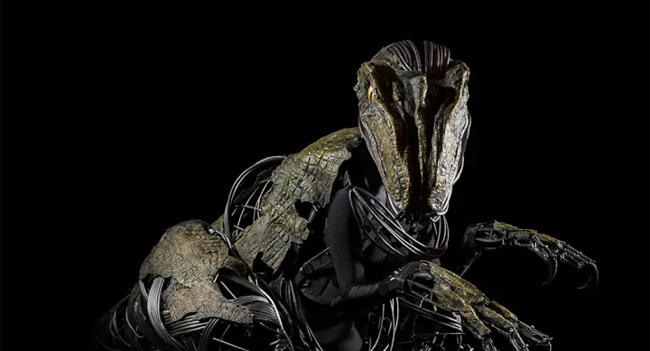Students combine design, science and technology to build animatronic raptor suits for the play Enron