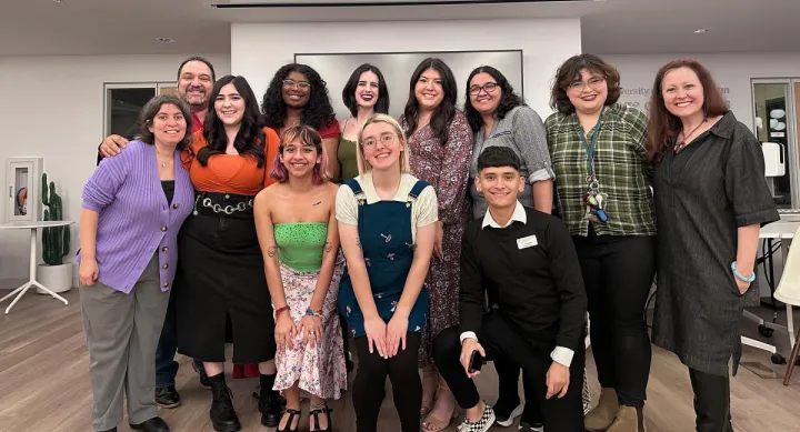 Nine UTeach Theatre graduates pose with three UTeach Theatre faculty, all smiling