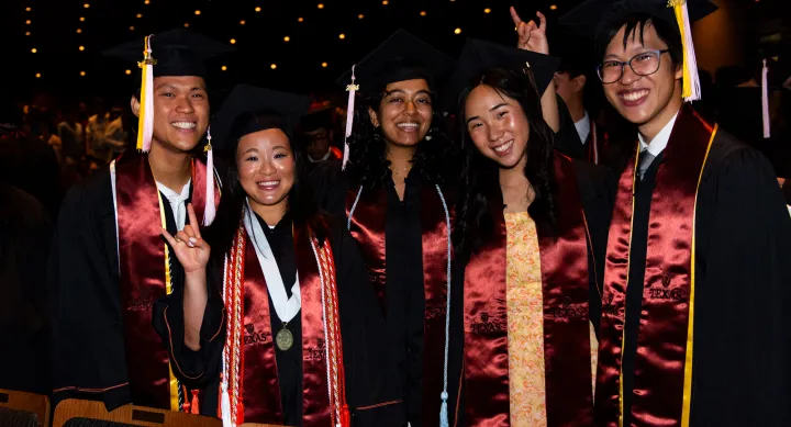 Group of graduates posing for photo