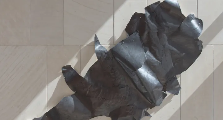 A metal sculpture on the wall