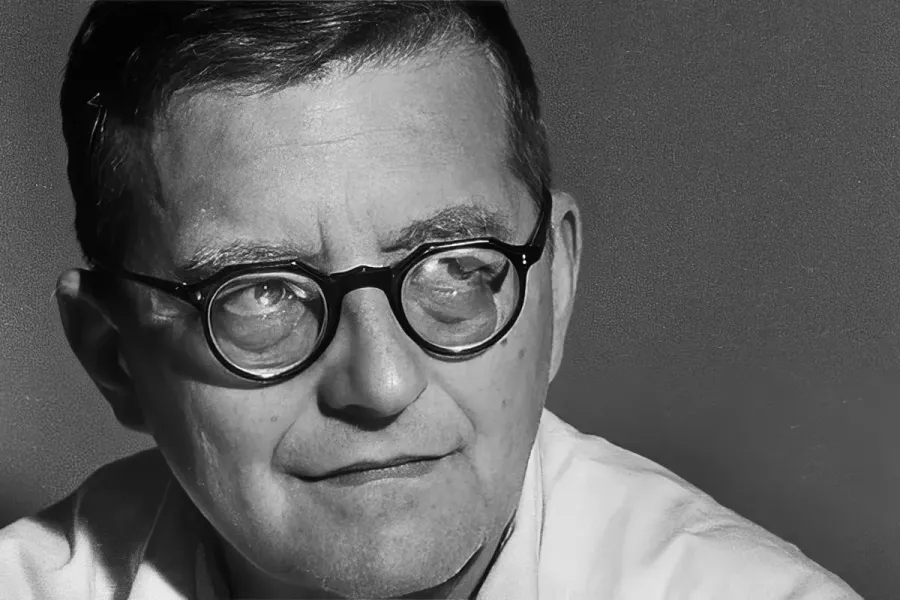 A black and white headshot of composer Dmitri Shostakovich.