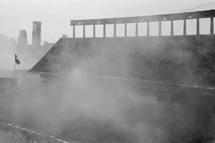 ariel view of Texas Memorial Stadium with smoke in foreground